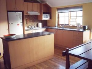 A kitchen or kitchenette at Woodvale at Cooma