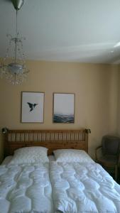מיטה או מיטות בחדר ב-Ferienhaus Lilli