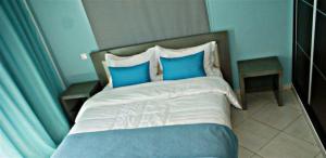 Кровать или кровати в номере Zitouna Rooms