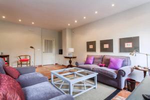 Posedenie v ubytovaní Apartamento Plaza Nueva