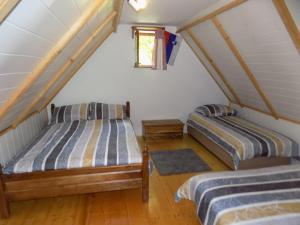 Postel nebo postele na pokoji v ubytování Holiday Home Na planini
