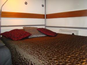 Un pat sau paturi într-o cameră la Tejo Apartment