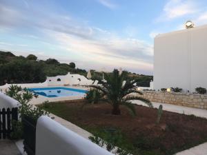 The swimming pool at or close to Cavo Plako Villas