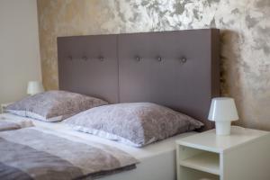Postel nebo postele na pokoji v ubytování Villa Fe Malinska