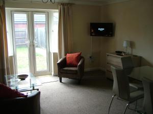 A television and/or entertainment centre at Thistle Cottage