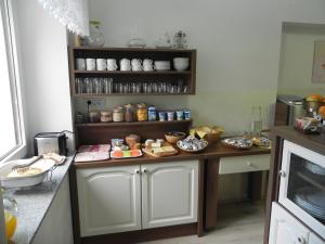 Kuchyň nebo kuchyňský kout v ubytování Apartments Vesna