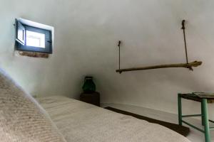 Posteľ alebo postele v izbe v ubytovaní Trullo Picchiagiuda