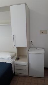 Postel nebo postele na pokoji v ubytování B&B - Meuble' - Hotel " CORDIALE "