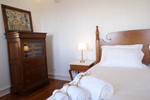Cama ou camas em um quarto em Quinta Paços do Lago