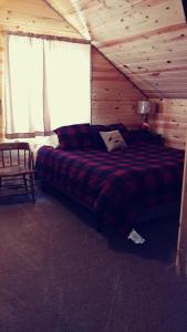 Postel nebo postele na pokoji v ubytování Wonder Inn Outback