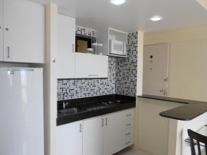 Köök või kööginurk majutusasutuses Luxuoso Quarto E Sala Mobiliado