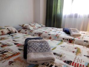 Cama o camas de una habitación en Las Dunas Apartment