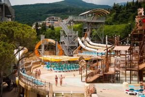a water park with a water slide and slides at Aquapark-Hotel Atlantida in Yalta