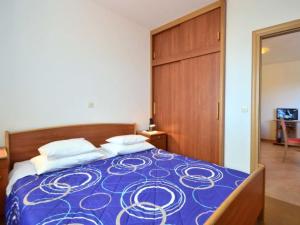Postel nebo postele na pokoji v ubytování Apartments Milin