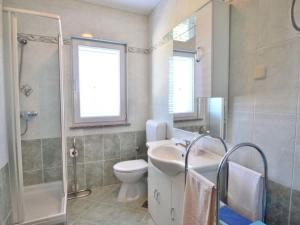 Koupelna v ubytování Apartments Milin