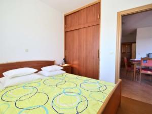 Postel nebo postele na pokoji v ubytování Apartments Milin