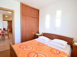 Postel nebo postele na pokoji v ubytování Apartments Milin