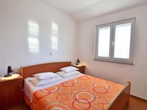 Postel nebo postele na pokoji v ubytování Apartments Milin