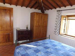 Voodi või voodid majutusasutuse Dimora nel Chianti toas