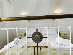 Postel nebo postele na pokoji v ubytování To Maro