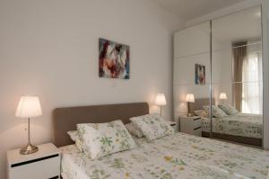 A bed or beds in a room at Iva, Opatija centar
