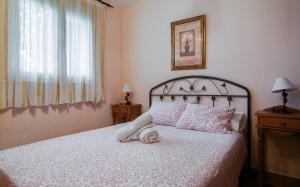Katil atau katil-katil dalam bilik di Casa Rural el Canal