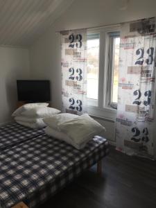 Voodi või voodid majutusasutuse Seaview Cottage Solvik - Kungshamn toas
