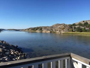 a view of a river from a bridge at Seaview Cottage Solvik - Kungshamn in Kungshamn