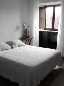 Een bed of bedden in een kamer bij ilab rural bed&breakfast