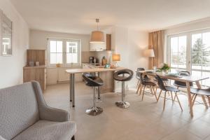 Η κουζίνα ή μικρή κουζίνα στο Villa Manatee mit Sauna und Fitness