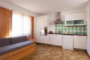 Kuchyň nebo kuchyňský kout v ubytování Residence Rododendro