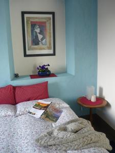A bed or beds in a room at Cascina Sant'Eufemia