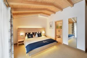 Una cama o camas en una habitación de Hotel Cervo