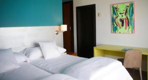 Кровать или кровати в номере Hotel Ritual Torremolinos- Adults Only