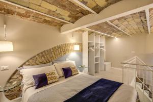 Ένα ή περισσότερα κρεβάτια σε δωμάτιο στο Domus Urbana