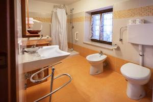 Koupelna v ubytování Albergo Diffuso "Col Gentile" Socchieve