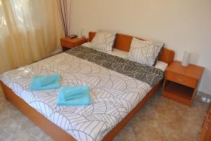 Postel nebo postele na pokoji v ubytování Apartments & Studio Matan