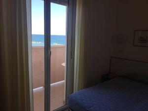 Postel nebo postele na pokoji v ubytování Hotel Man