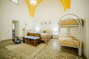 Postel nebo postele na pokoji v ubytování Casa Meluccia