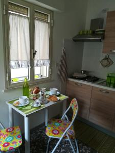 Kuchyň nebo kuchyňský kout v ubytování Casa Meluccia