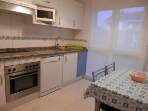 Kuchnia lub aneks kuchenny w obiekcie Apartamento Dicar