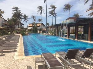 Swimmingpoolen hos eller tæt på Apt no Taiba Beach Resort