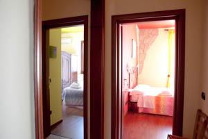 Postel nebo postele na pokoji v ubytování B&B Raffiori