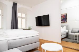 Ein Bett oder Betten in einem Zimmer der Unterkunft KulturQuartier