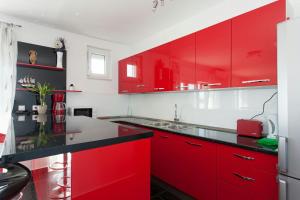 Kuchyňa alebo kuchynka v ubytovaní Apartmani Jukic