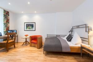Postel nebo postele na pokoji v ubytování Hotel Goldener Engel