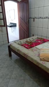 เตียงในห้องที่ Pousada Da Restinga