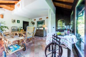 a living room with a table and chairs at Apartments Jaka in Dolenjske Toplice