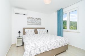 Una cama o camas en una habitación de Hanas Dream Places