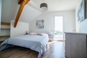 Postel nebo postele na pokoji v ubytování Gîte LaurieRaphael